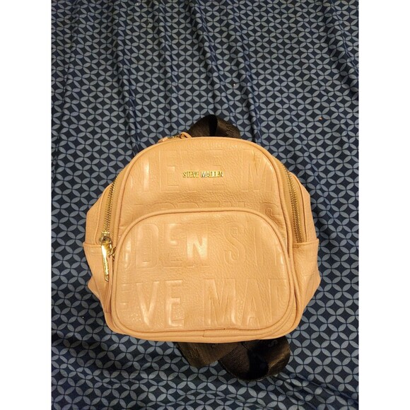Steve Madden Handbags - STEVE MADDEN mini Pink backpack with pockets&tassel